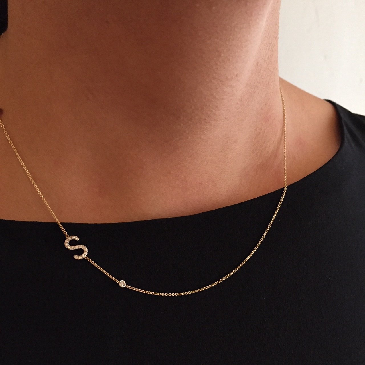 Diamond asymmetrical initial and bezel necklace